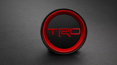 thumbnail image 2 of Genuine OEM Toyota Black Center Cap With TRD Logo – For Tacoma, FJ Cruiser (PTR20-35111-BK) 2 of 6