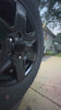SprayOnyx rear camera sprayer clearing a muddy Bronco rear camera view